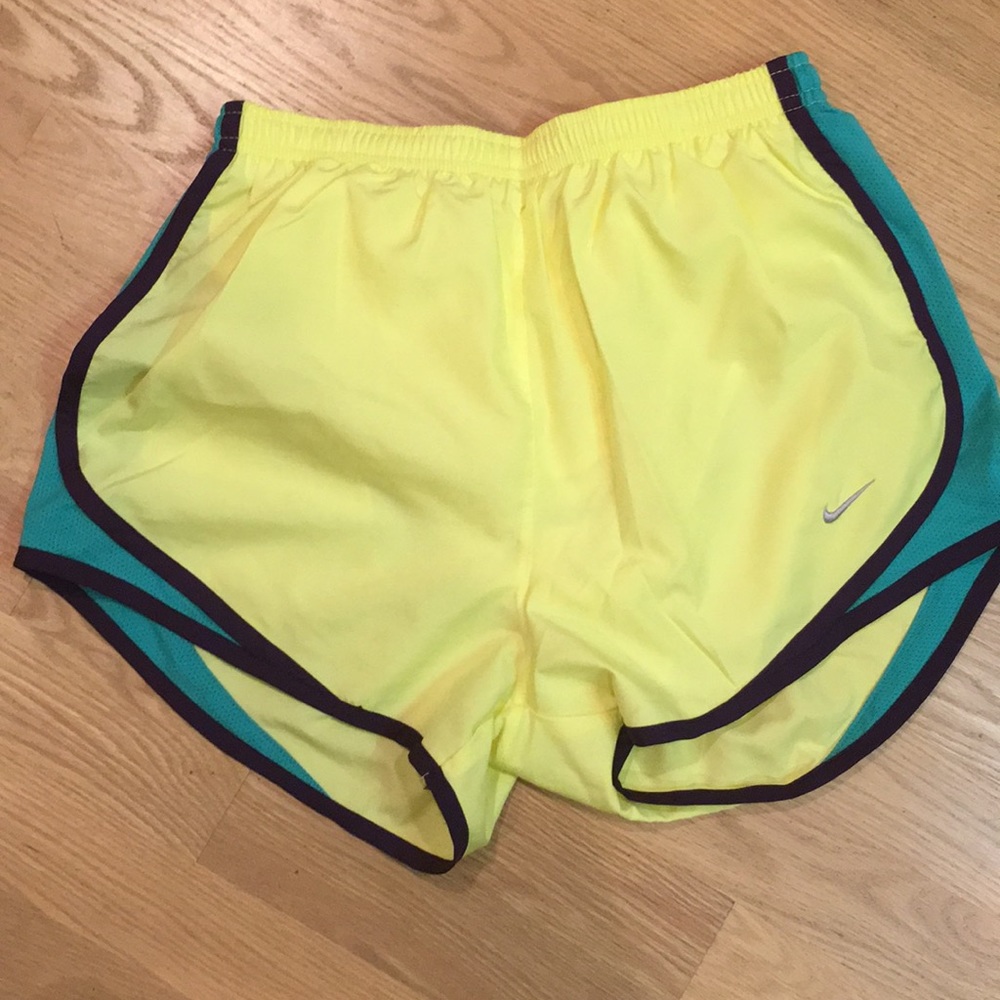 Nike dri -fit yellow /teal green running shorts.